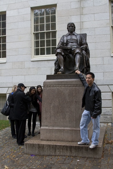 315-0591 Posing with Statue of John Harvard.jpg